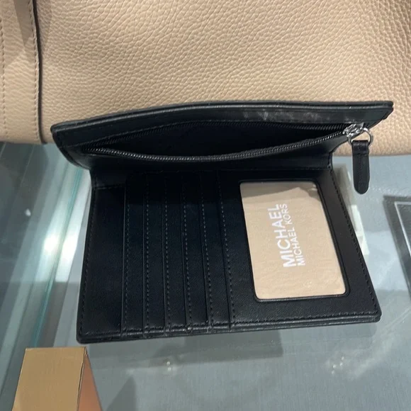 Michael Kors Jet Set Travel Passport Wallet
Black Signature/Silver-Tone Hardware - Picture 10 of 16